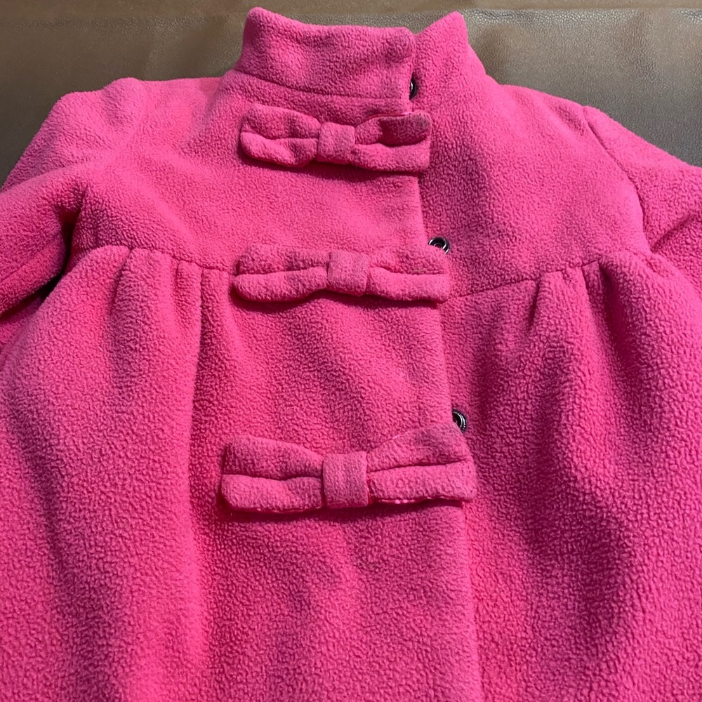 Jumping Beans Pink Cape with Bow Closures and High Collar